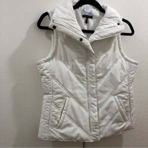 Daisy Fuentes white puffer vest